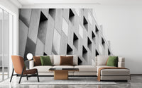 Bright living space showing textured 3D structural wall mural with modern furniture.