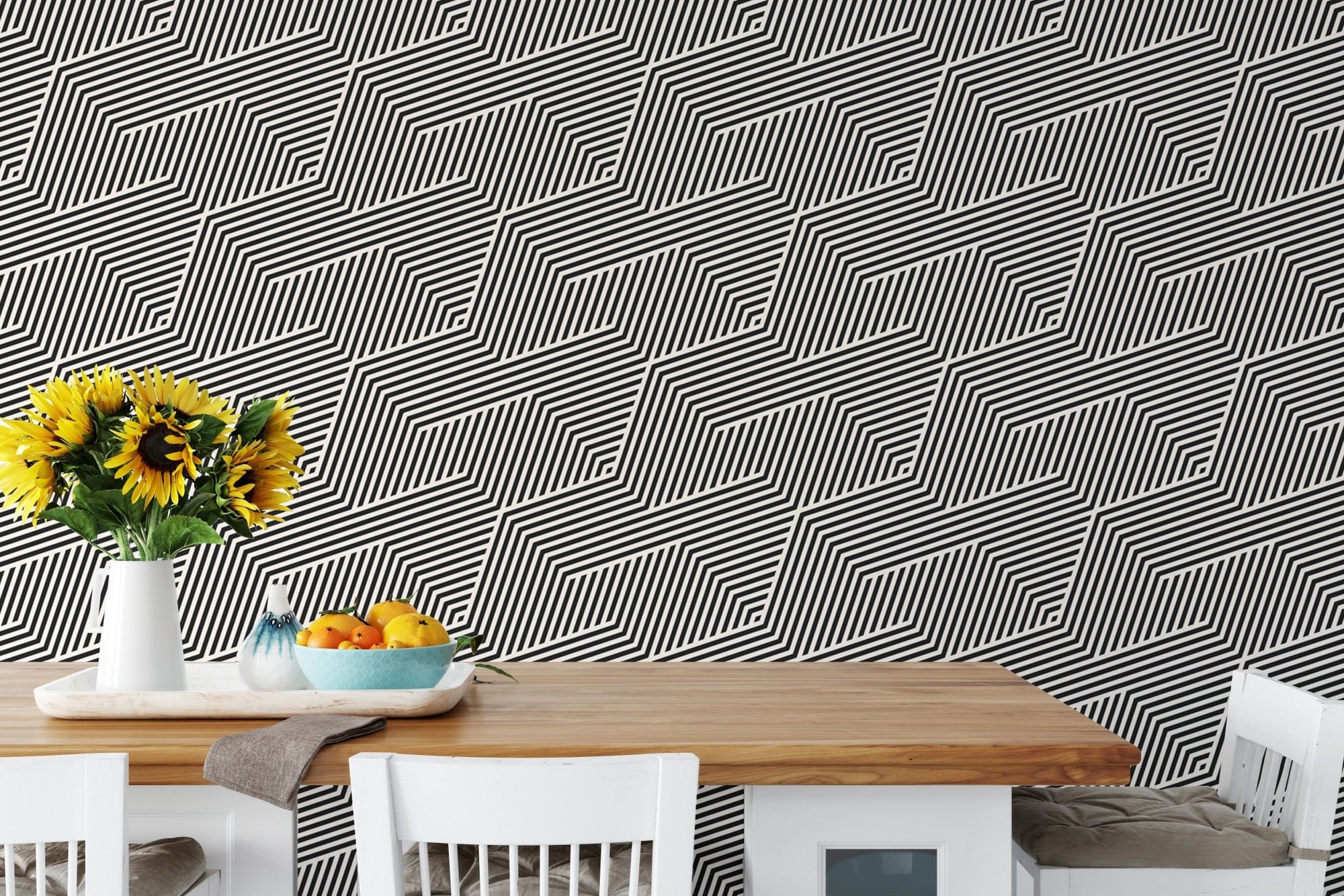 Black and white zigzag geometric stripes wallpaper in a dining area with sunflowers.