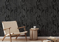 Sophisticated black Art Deco pattern wallpaper in reading room.