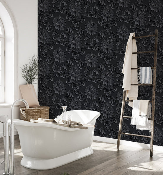 Abstract floral damask wallpaper in a bathroom with a white freestanding tub.