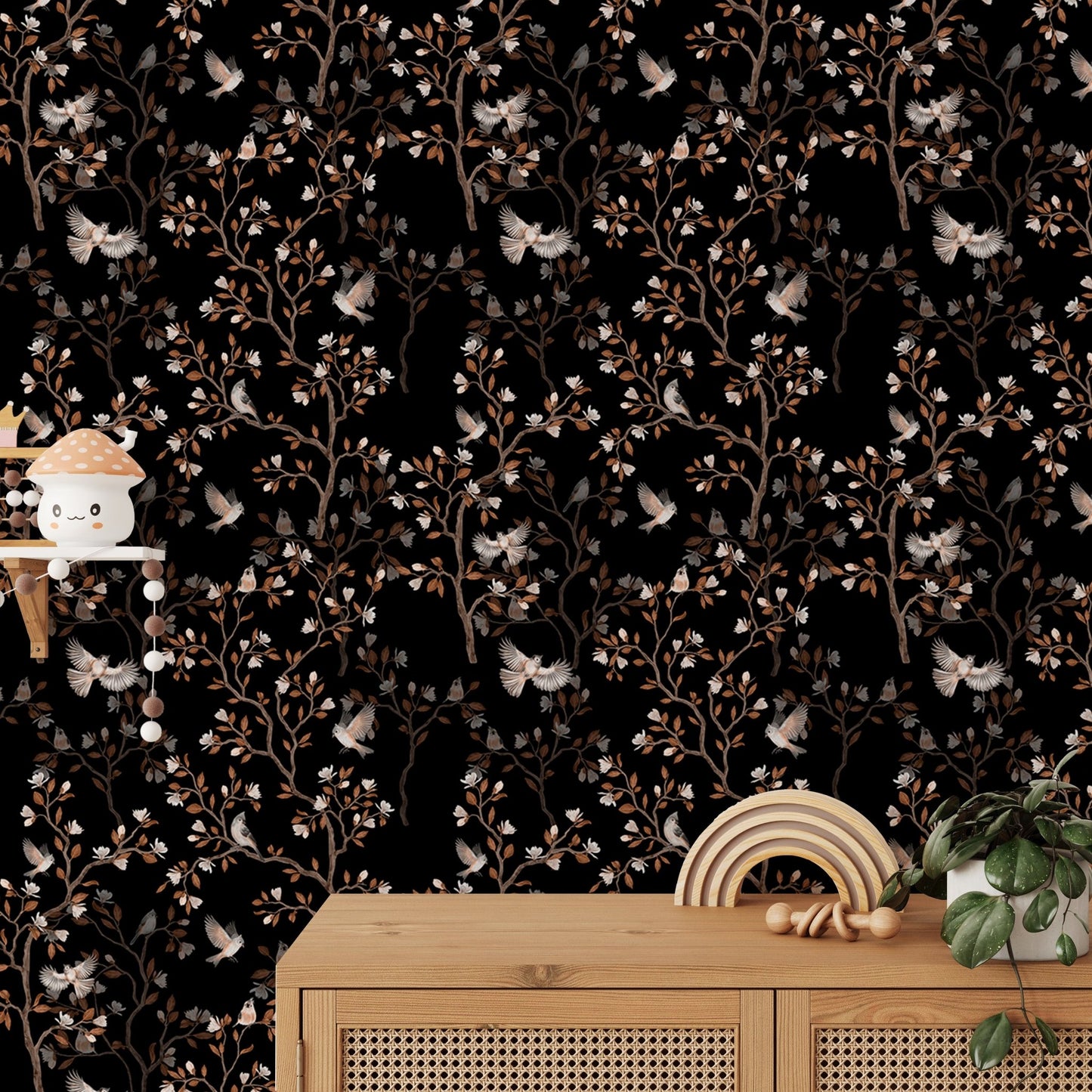 Black background wallpaper featuring brown magnolia branches behind a wooden cabinet.