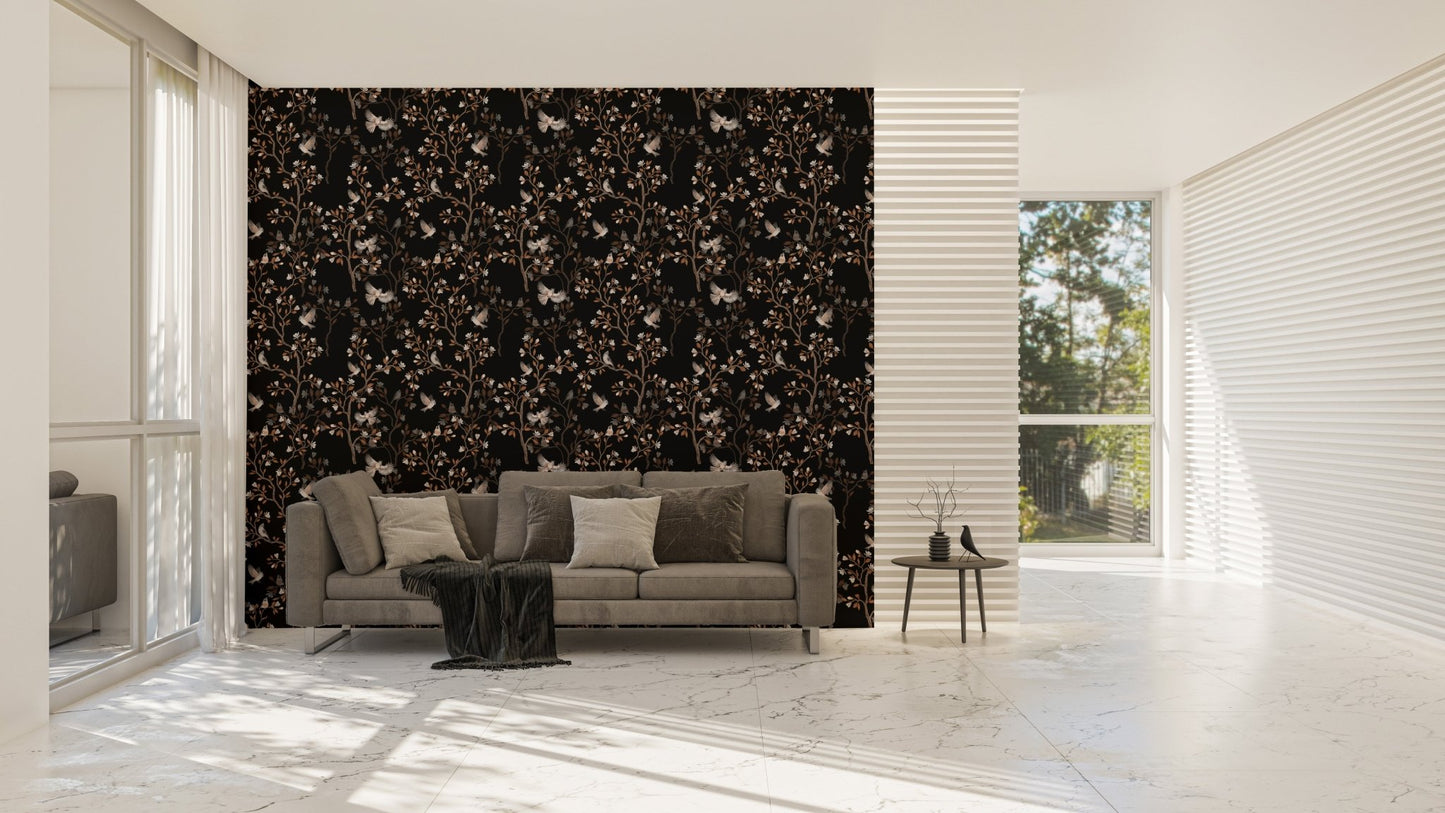 Dark tree wallpaper in a large living area with a grey sofa and natural light.