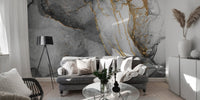 Black gold ink mural creating a luxurious wall aesthetic in sitting area.
