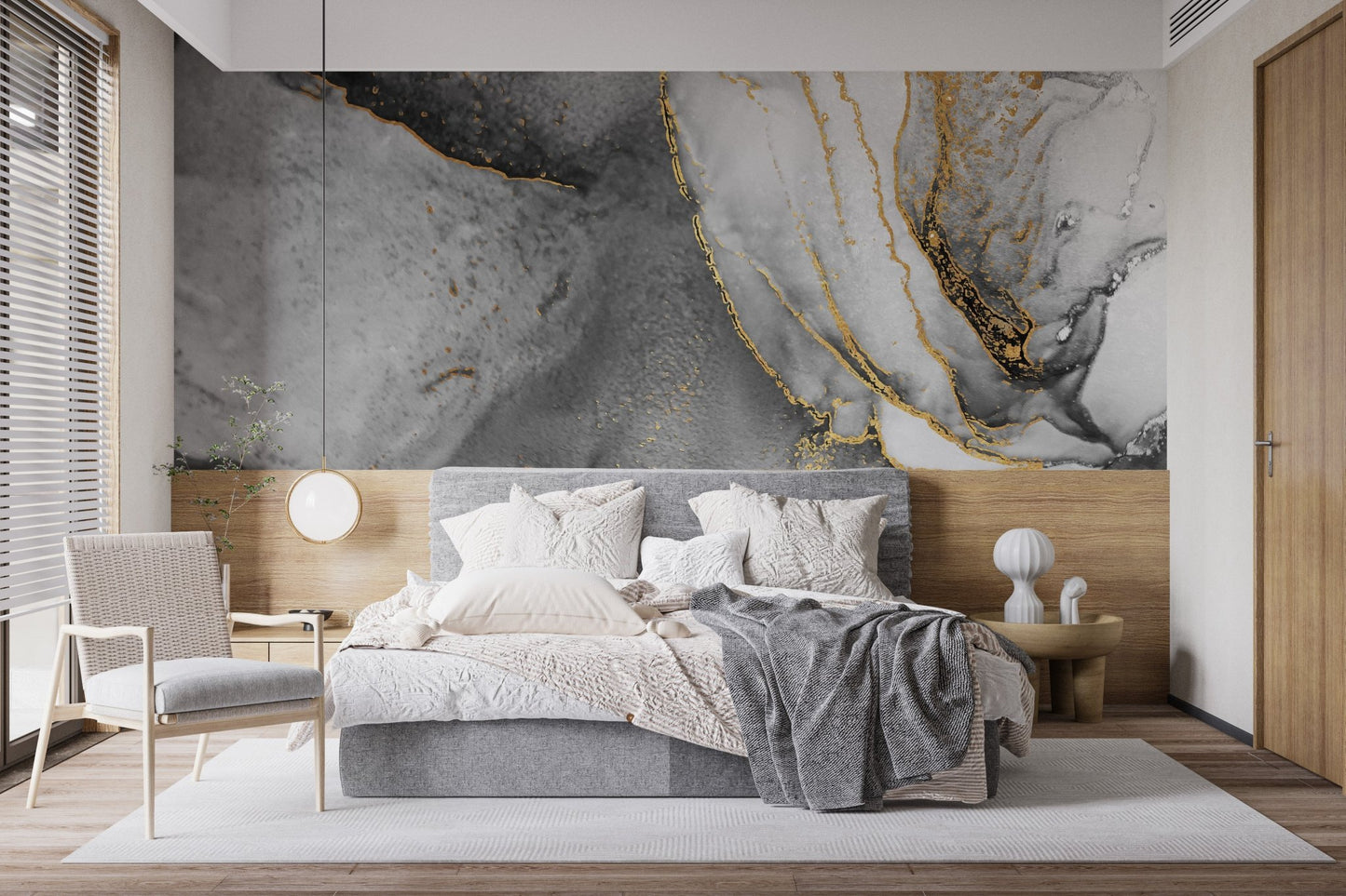 Abstract ink fusion mural with striking black and gold accents in bedroom.
