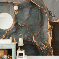 Large scale marble wall mural behind a vanity with a round mirror.