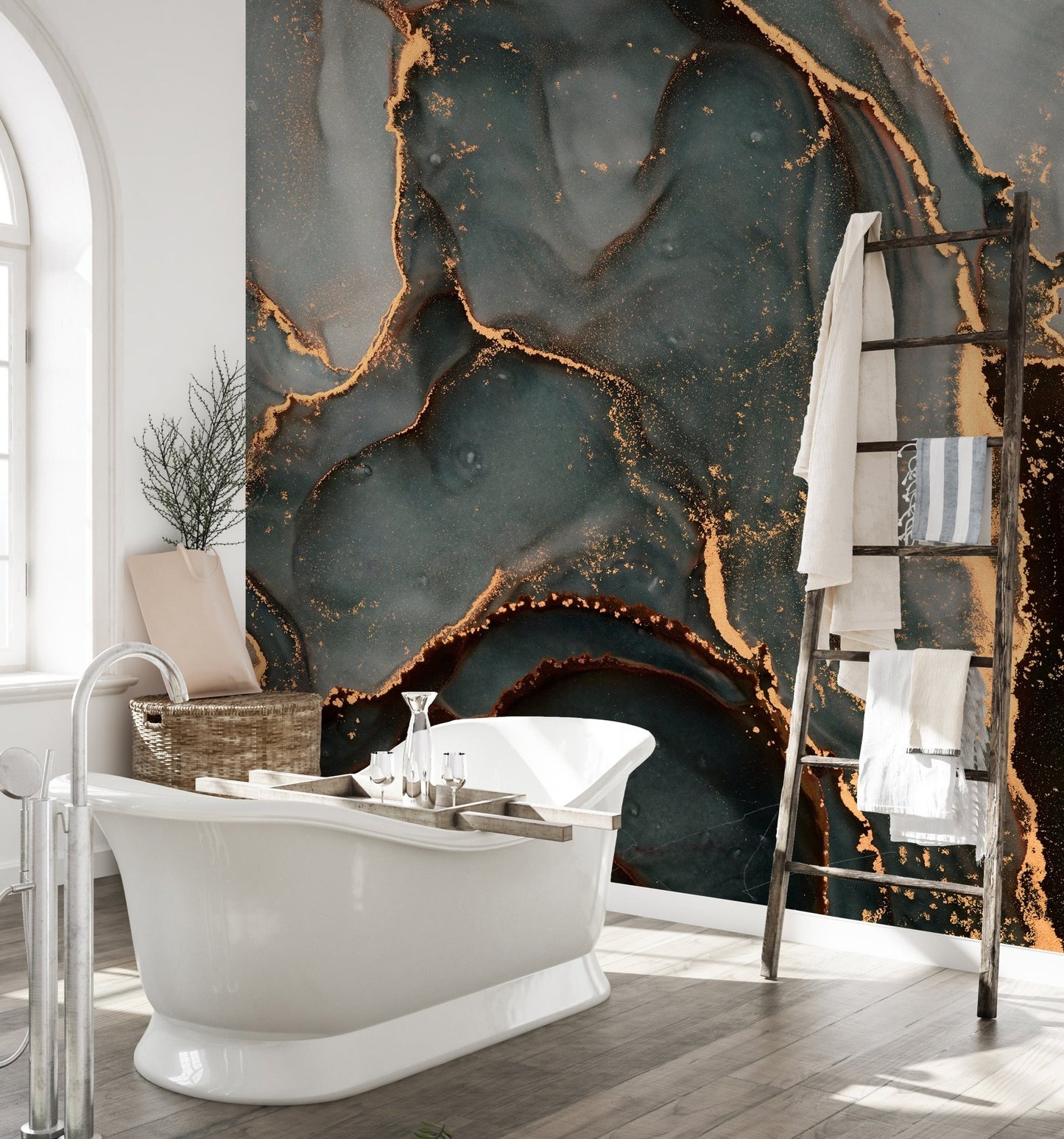 Grey and gold abstract wall mural in a bright bathroom with natural light.