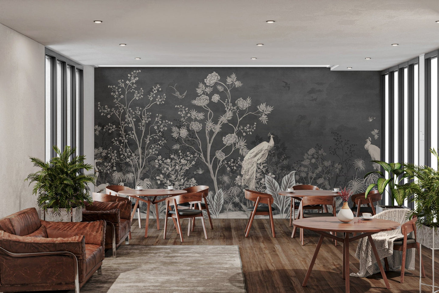 Dark jungle theme mural with white peacock and floral details in cafe area.