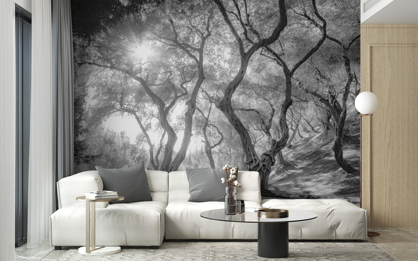 Monochrome forest wall mural in a white minimalist living room