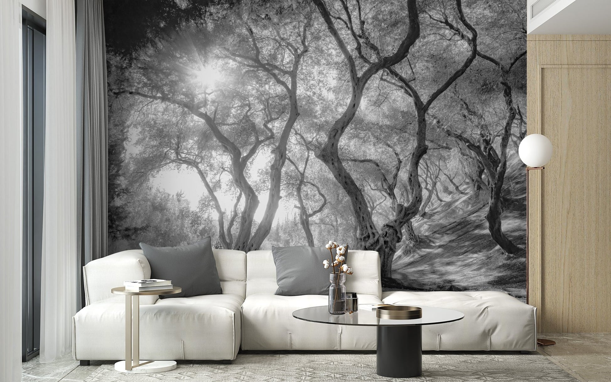 Monochrome forest wall mural in a white minimalist living room