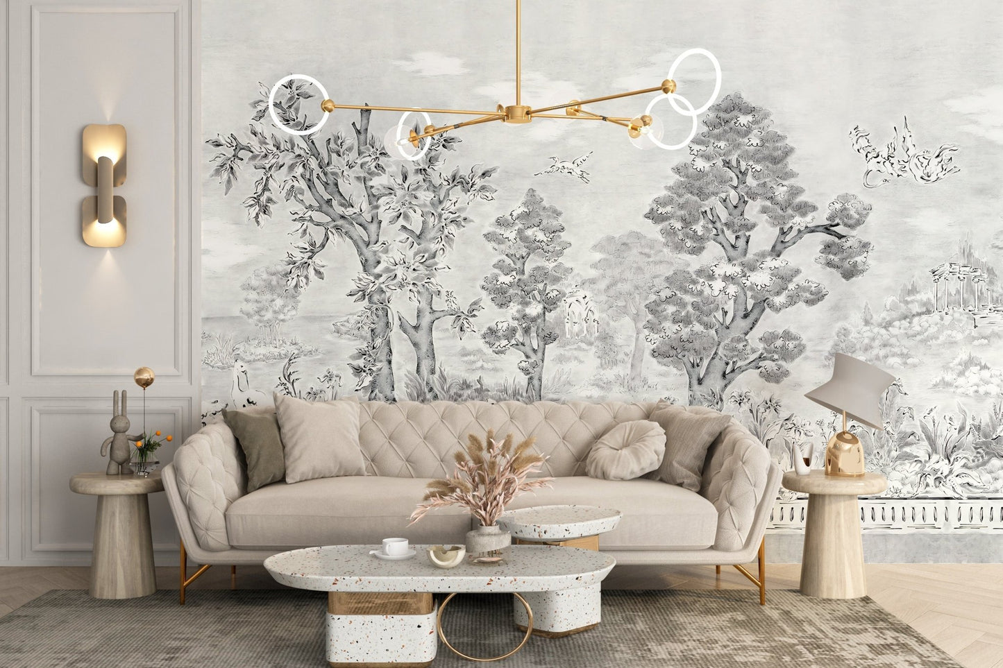Hand-painted style tree wall mural behind a cream sofa with gold lighting.
