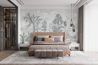 Tropical tree sketch wall mural in a master bedroom with dark wood accents.