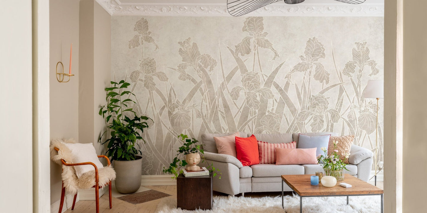 Beige flower wall mural in living room behind light grey sofa and wooden coffee table.