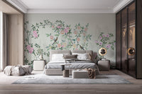 Blossoming Garden Trails Wall Mural behind a grey bed in a modern bedroom.