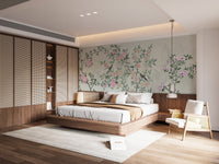Minimalist bedroom featuring a wood bed and garden trails wall mural.