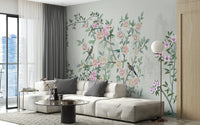 Modern living space with white seating and garden trail wall mural.