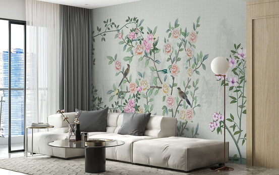 Modern living space with white seating and garden trail wall mural.