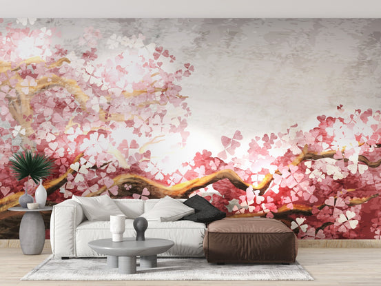 White sofa in a living room featuring pink cherry blossom wall mural and grey accents.