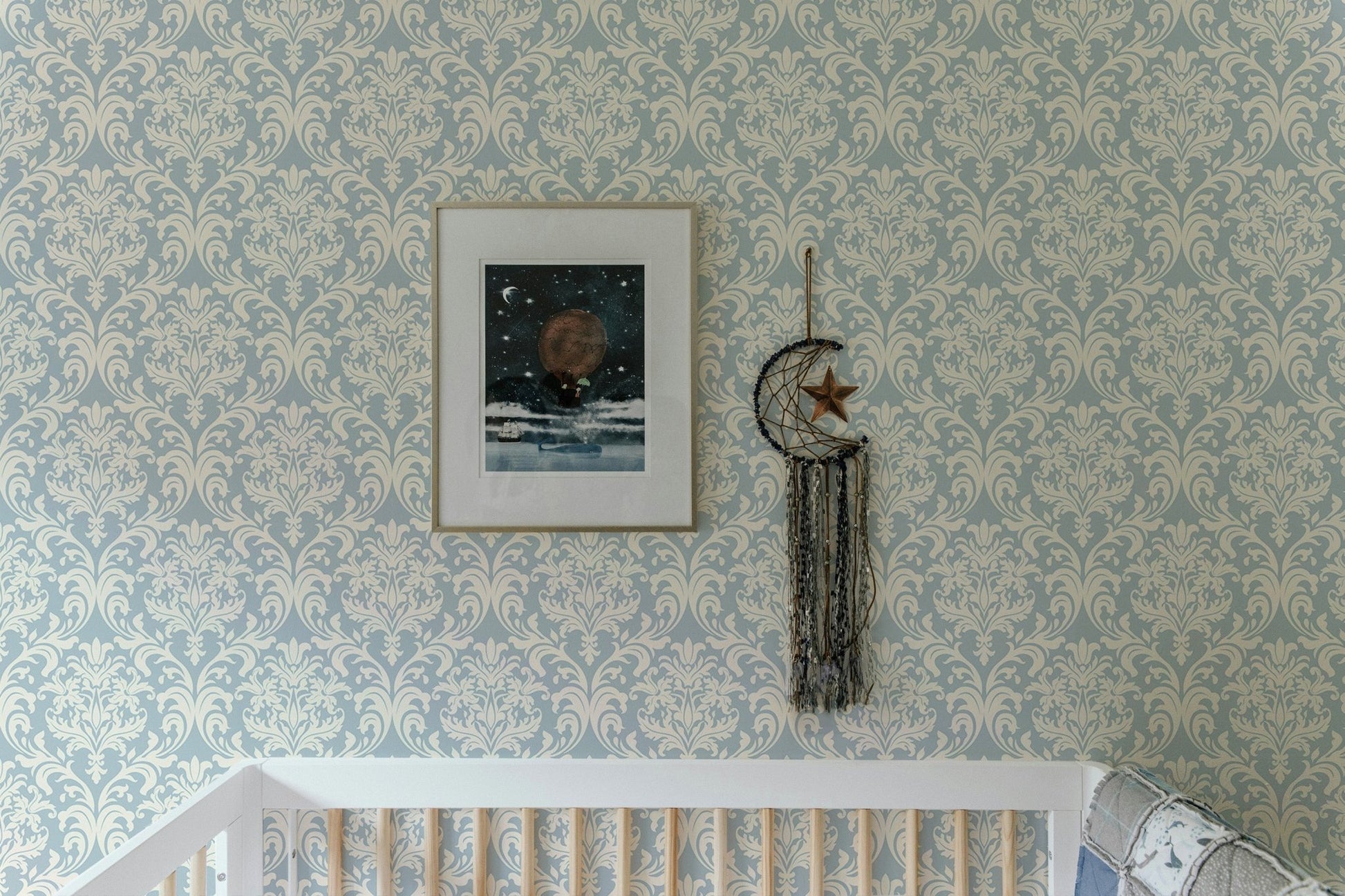 Victorian-style wallpaper in blue and beige tones for feature wall.