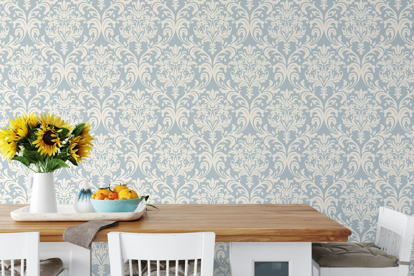 Dining room walls covered in Victorian patterned wallpaper.