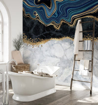 Luxury navy and gold marble wall mural in a bright bathroom setting.