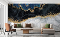 Sophisticated grey marbled wall mural with gold accents in a large flat.
