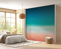 Soft blue-pink ombre sea wall mural for calming bedroom.