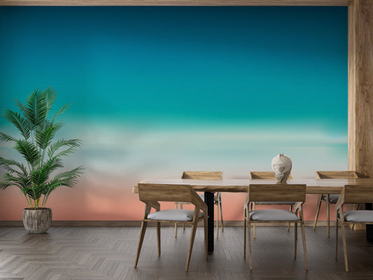 Wooden dining table set against a teal and pink gradient wall mural.