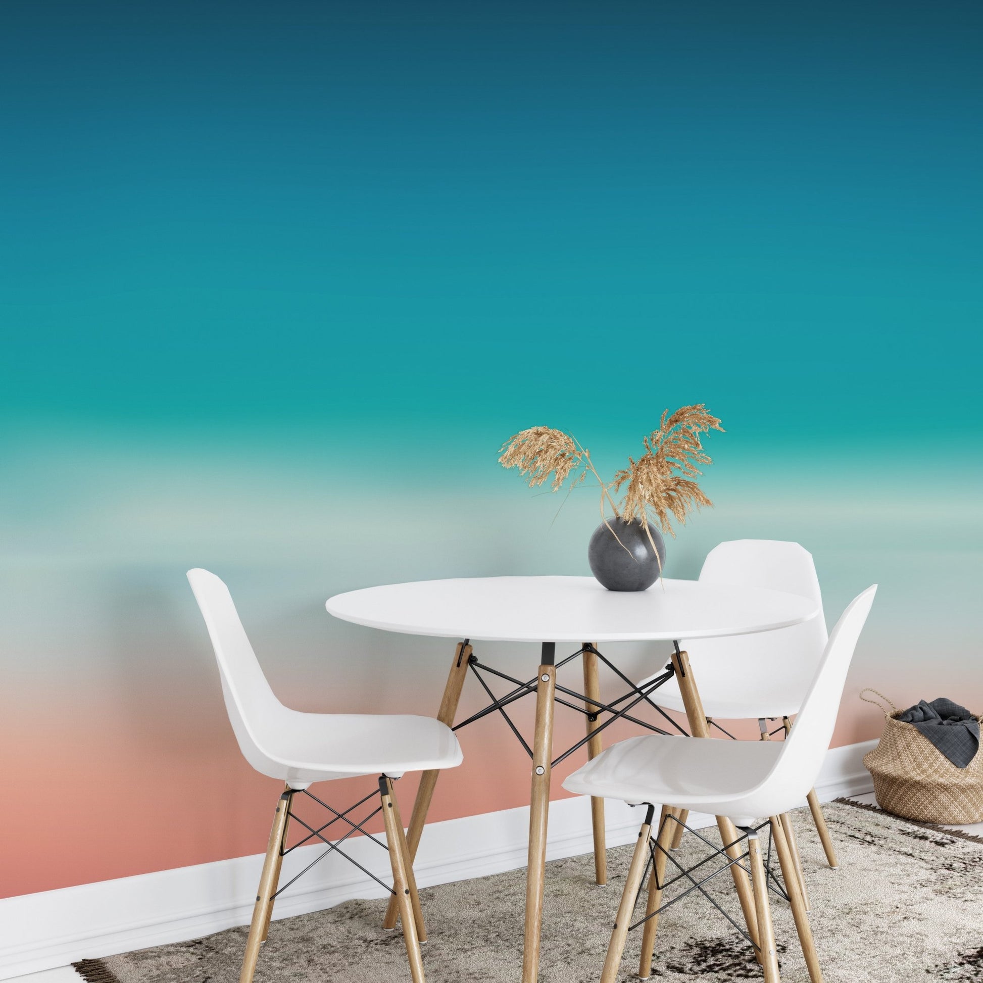 Ombre sea wall mural in blue and pink for tranquil dining space.