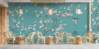 Large dining space showing blue background pink flower wall mural decor.