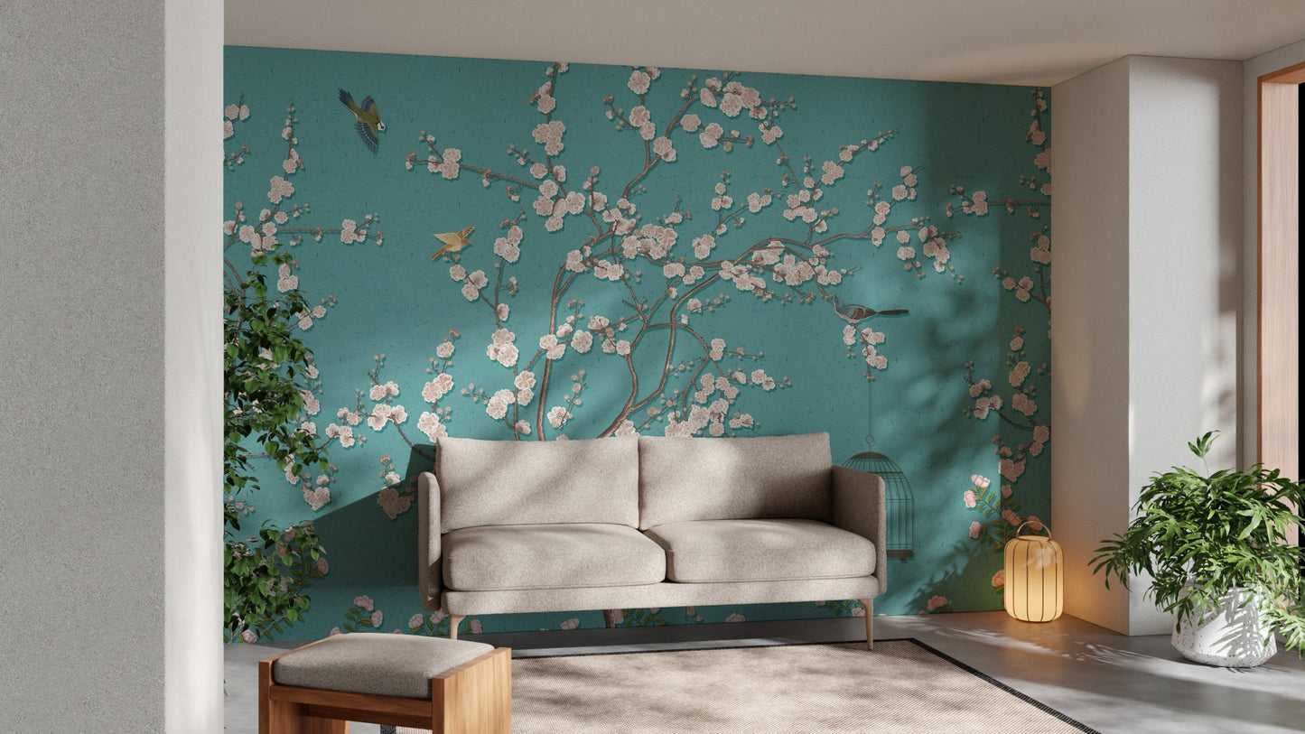 Minimalist living room featuring teal flower wall mural and a grey sofa.