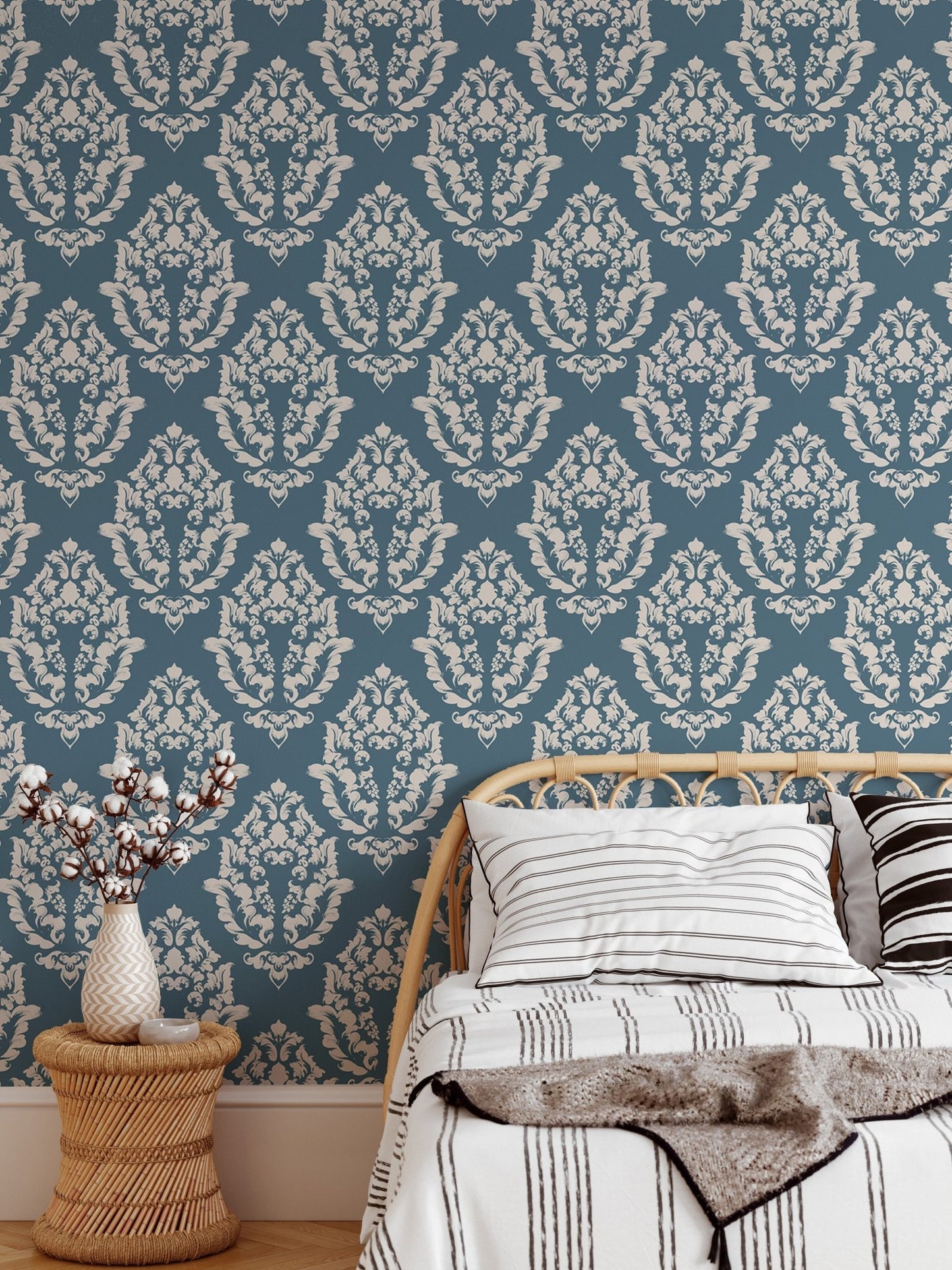 Traditional damask wallpaper design in a bright, airy bedroom.