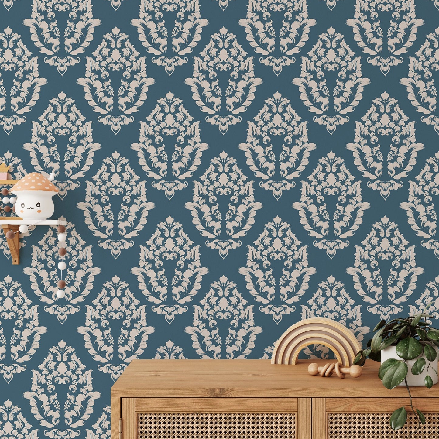Damask wallpaper pattern in a home with a wooden desk and shelf.