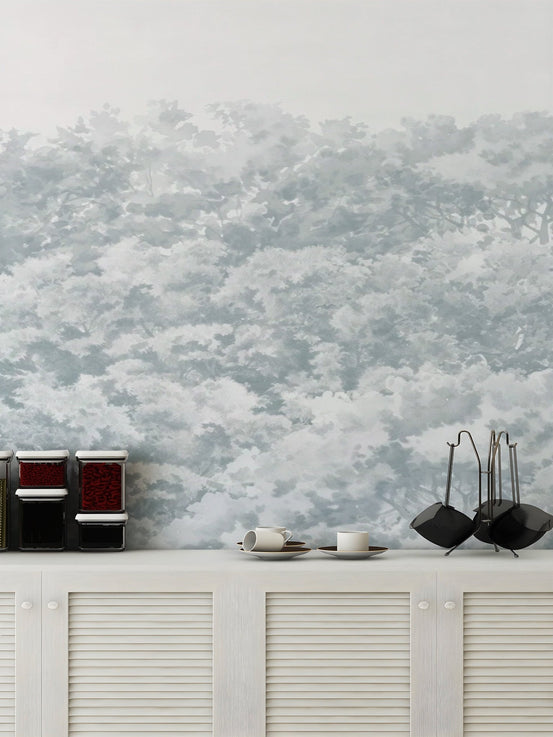 Blue buttonwood tree wallpaper with misty forest canopy design.