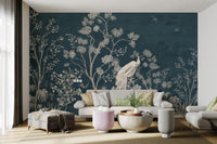 Chinoiserie wall mural with blue blossoms in bright living room.