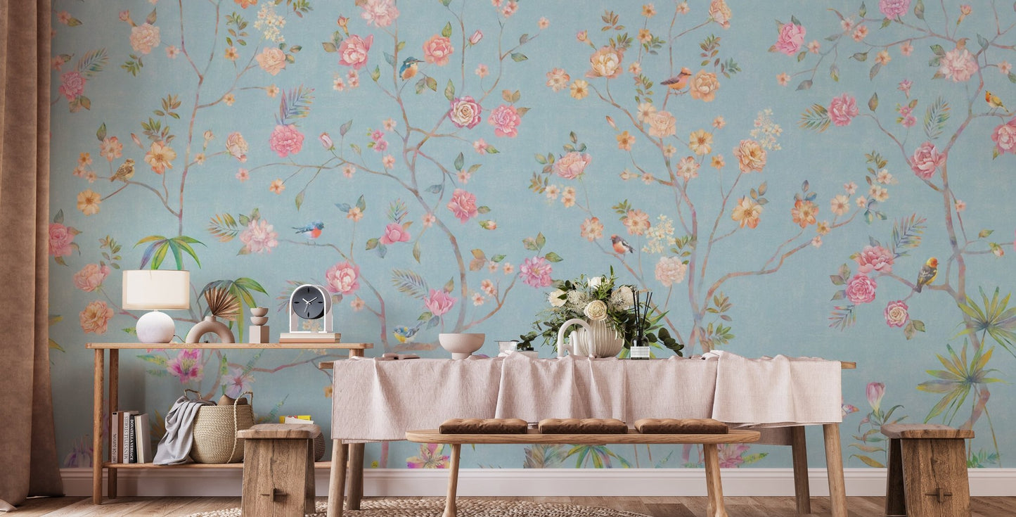 Minimalist dining space with a light blue floral wall mural background.