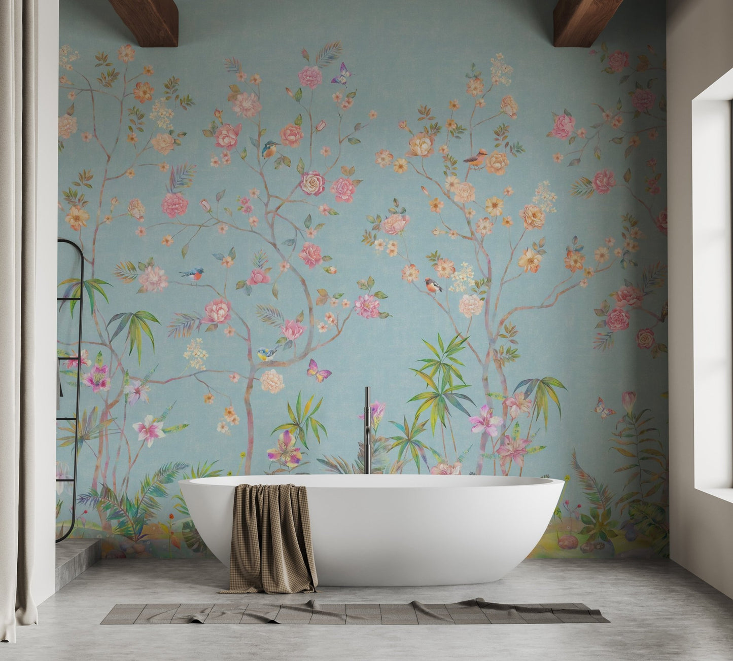 Bathroom interior with a white freestanding tub and blue floral wall mural.