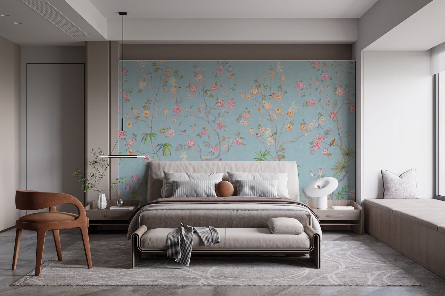 Bedroom setup with a grey bed frame against a blue floral wall mural.