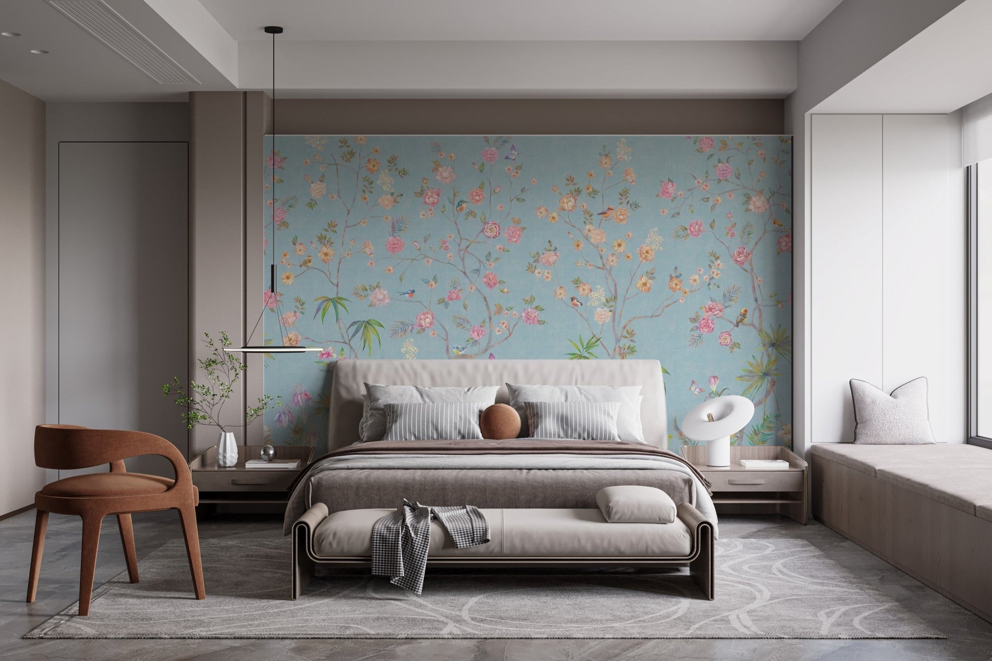 Bedroom setup with a grey bed frame against a blue floral wall mural.