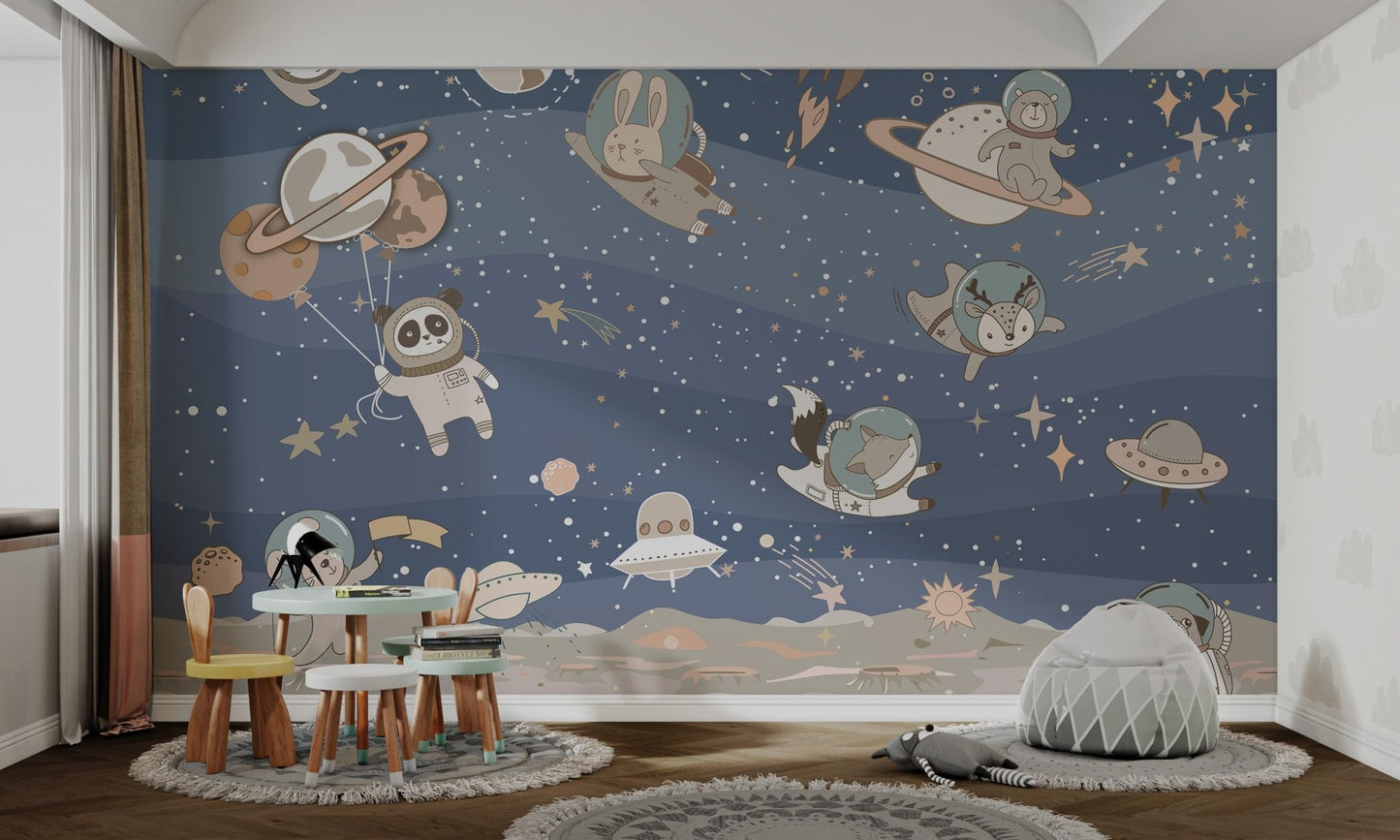 Cute blue mural with space animals floating joyfully for kids room.