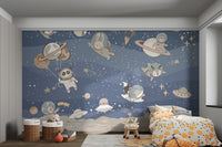 Playful animals explore the cosmos in this blue space wall mural.