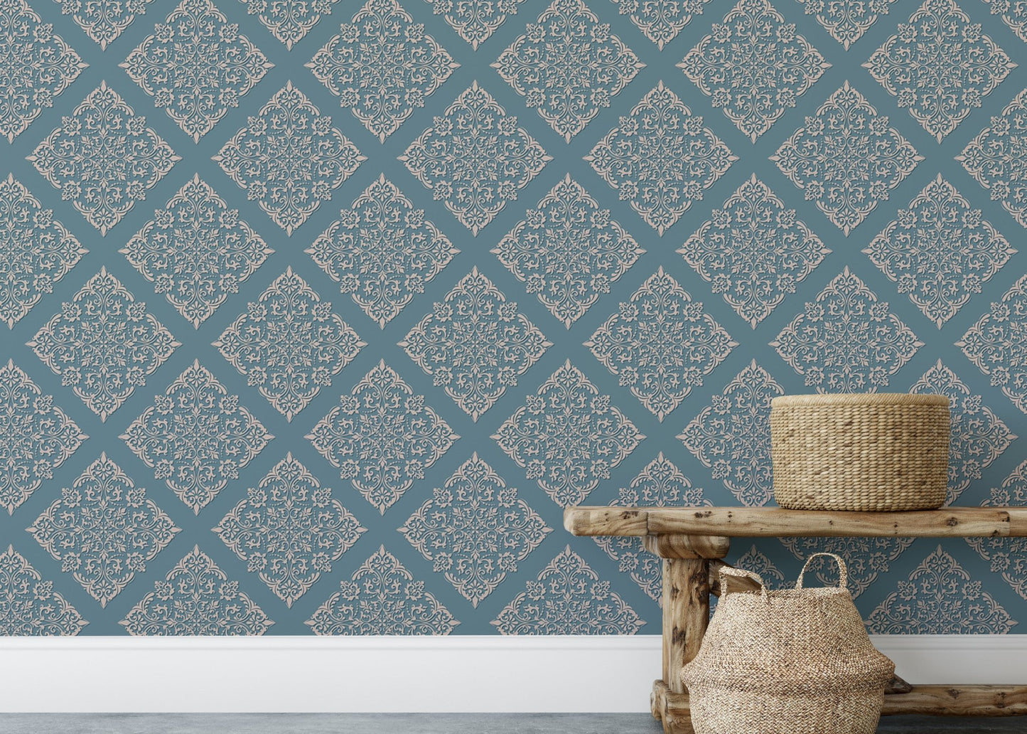 Blue damask wallpaper on living room wall behind wooden bench.