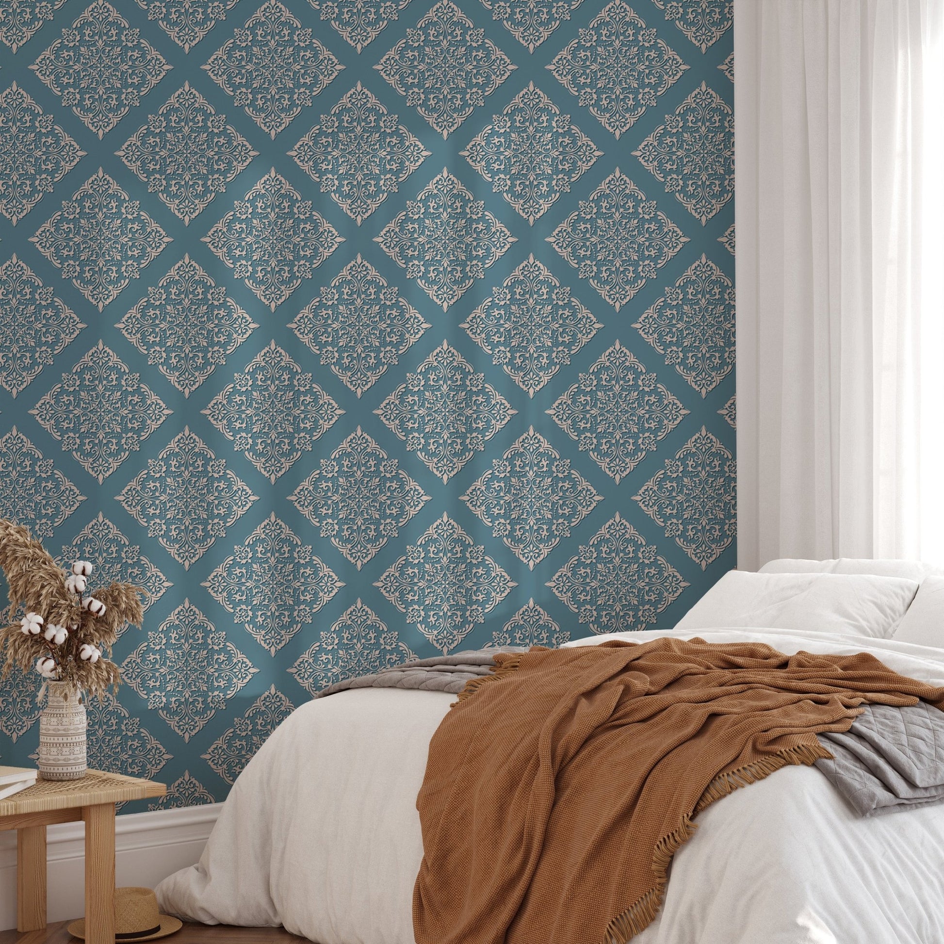 Modern damask wallpaper in master bedroom with brown throw blanket.
