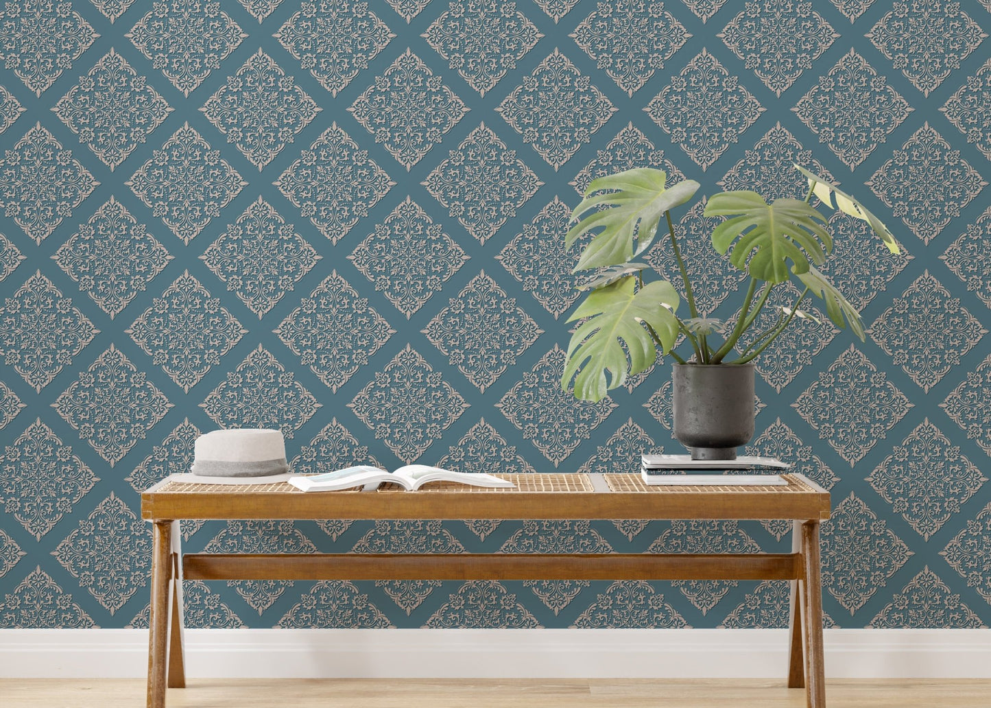 Blue color wallpaper in home office behind minimalist wooden desk.