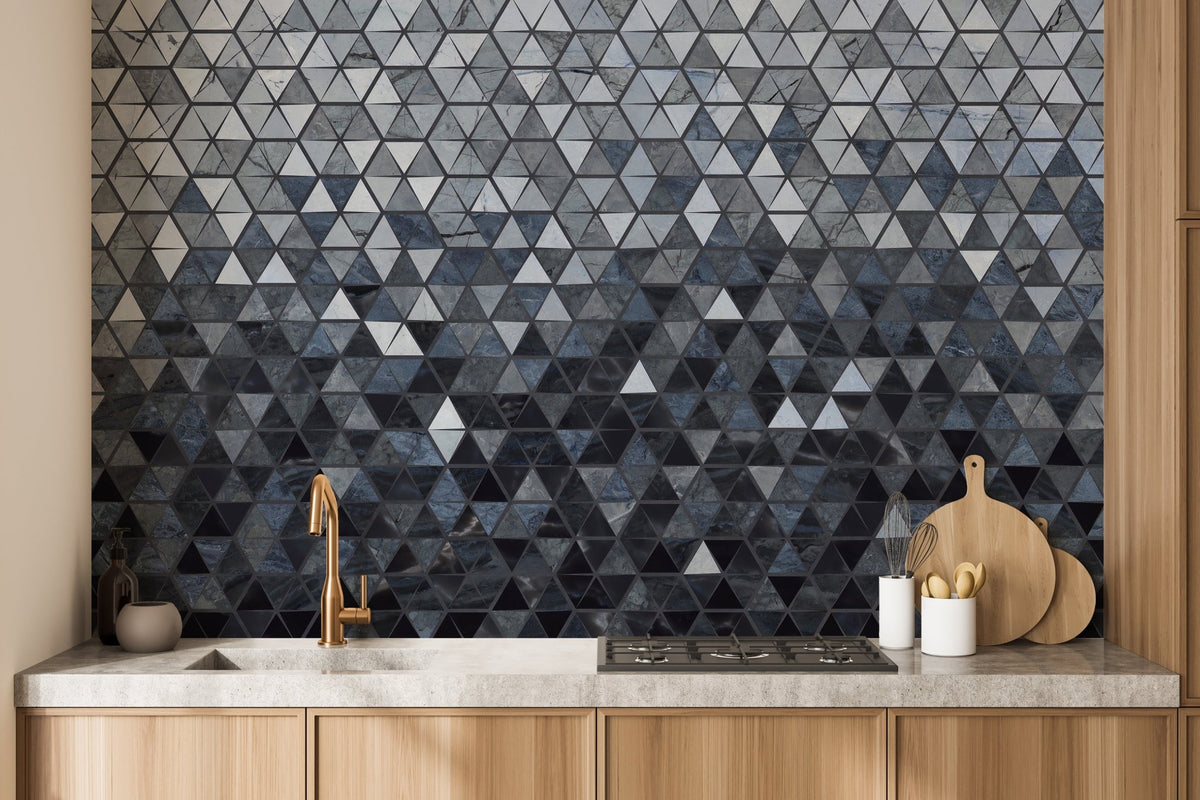 Kitchen backsplash area featuring dark blue mosaic triangle wall mural.