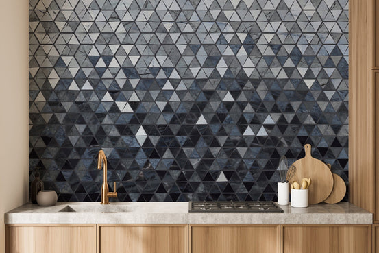 Kitchen backsplash area featuring dark blue mosaic triangle wall mural.