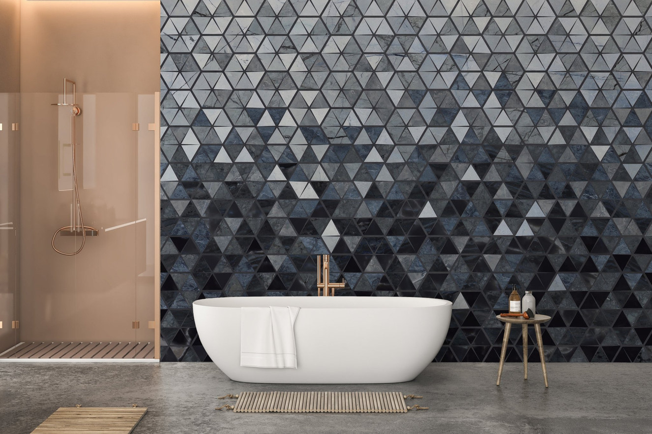 Modern bathroom with white tub and Blue Geometrical Triangle Wall mural.