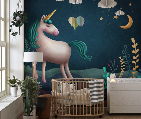 Dark navy night sky unicorn wall mural beside a baby crib in toddler room.