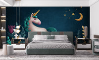 Blue and green night unicorn wall mural in a minimalist suite