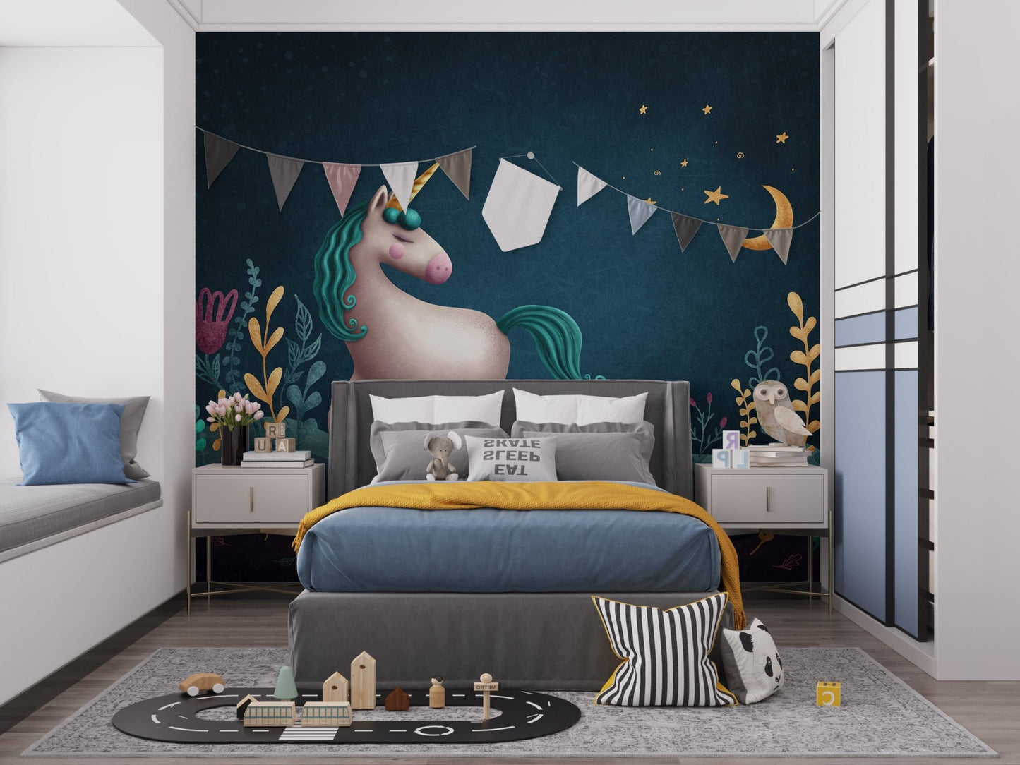 Night sky unicorn wall mural above a grey bed in a modern kids bedroom.