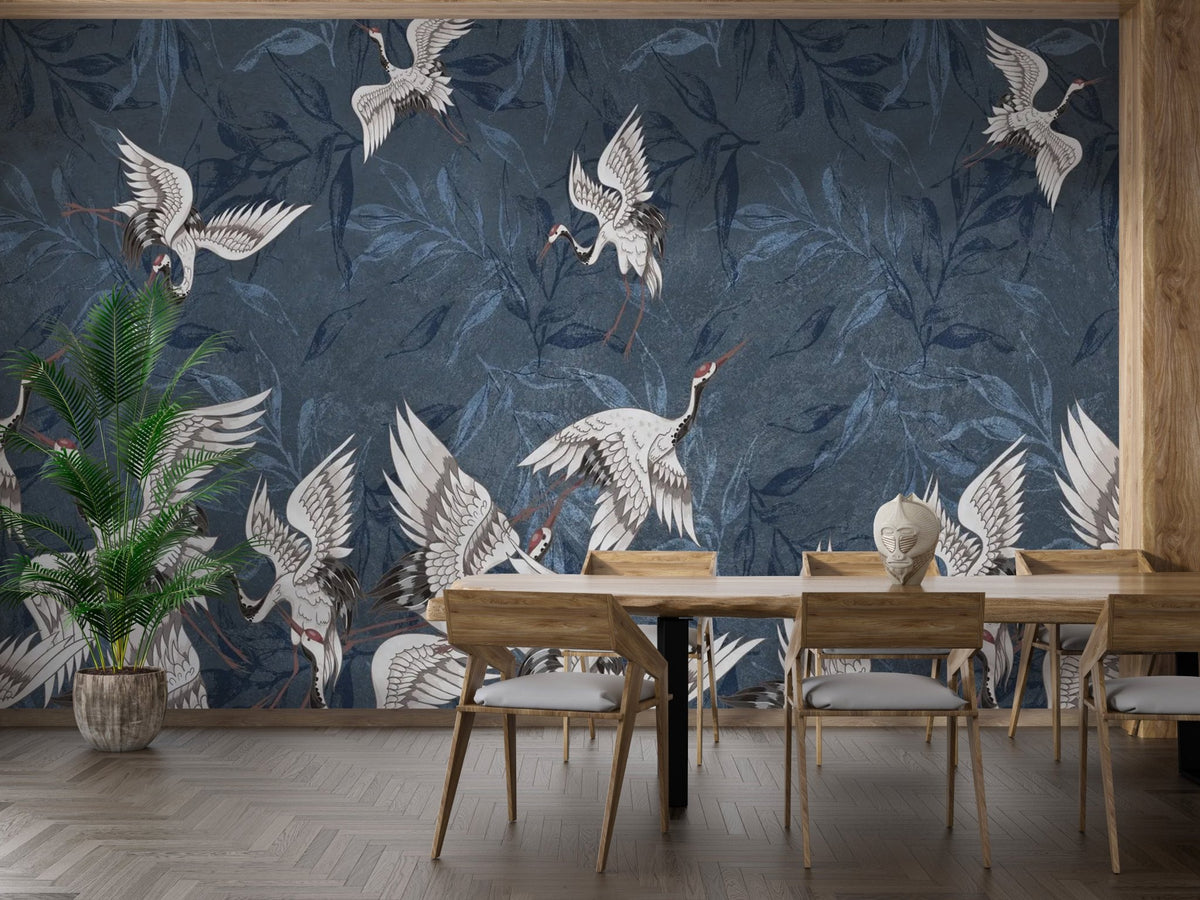 Sleek wall mural with soaring birds and cool blue leaves silhouettes.